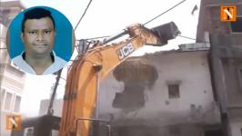 Bulldozer in Action: Illegal Portions of Fahim Khan’s House Demolished by NMC
								