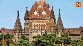 High Court Strikes Down NMC Tender for Hoardings on Footpaths
								