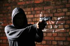 Robber Dies After Being Pushed by Victim During Robbery
								